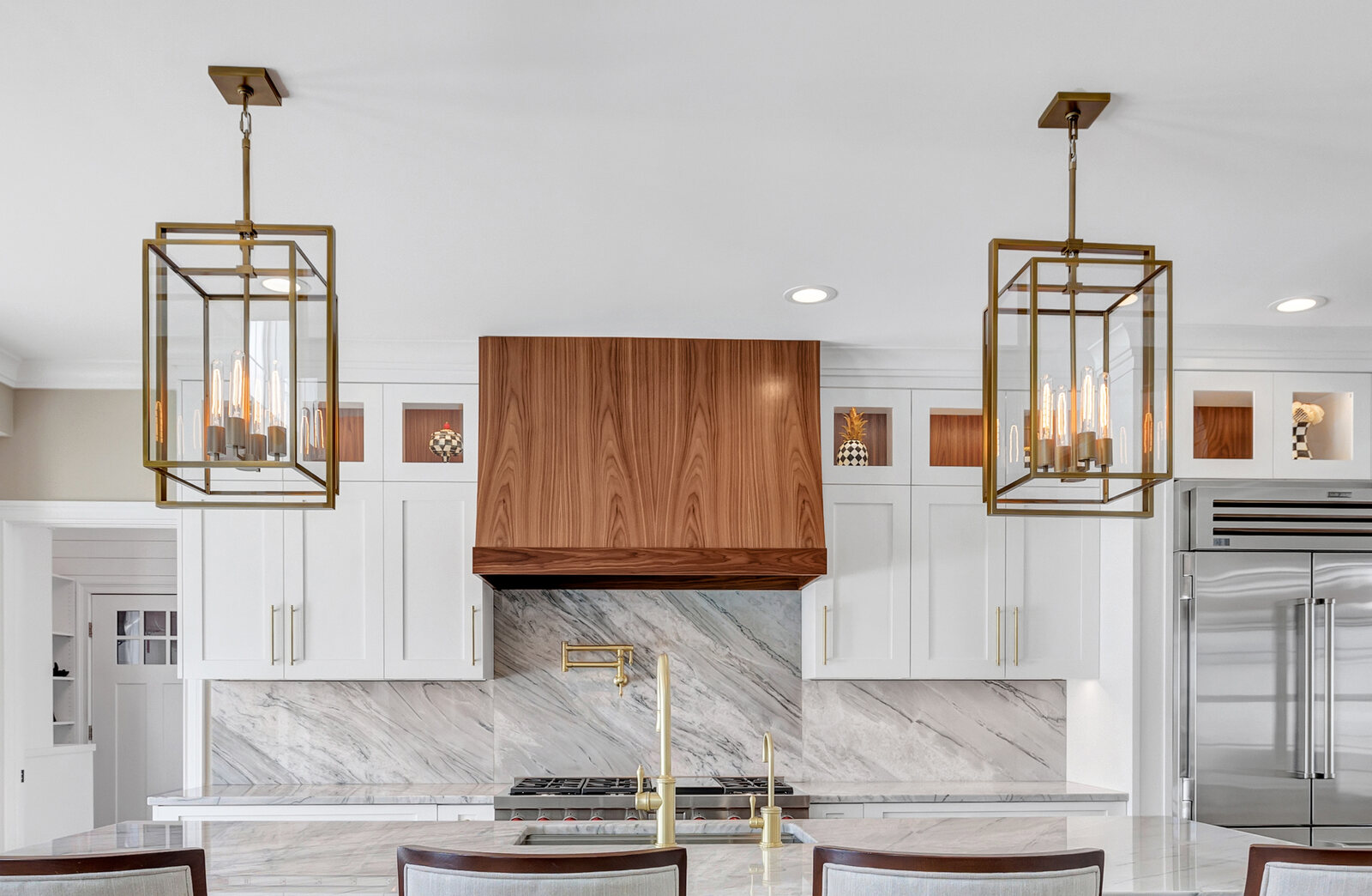 Walnut hood in a finished kitchen