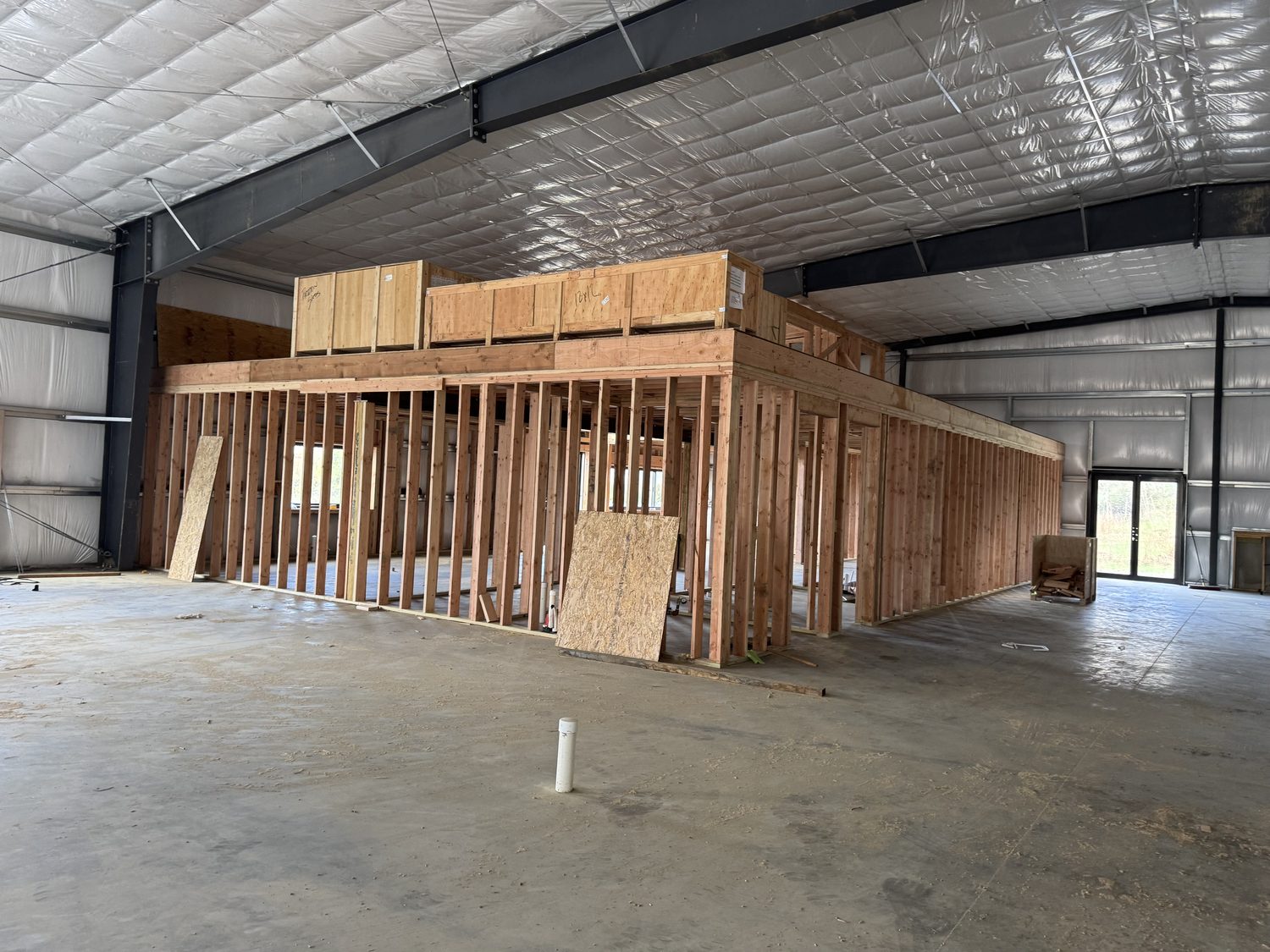The showroom framed out inside the new Milford building