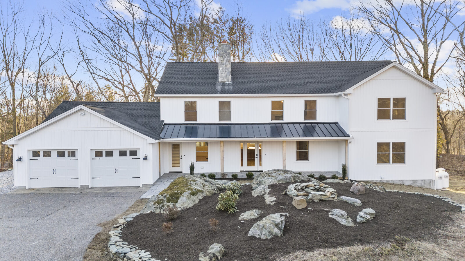This home after, a rebuilt two-story colonial
